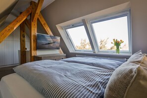 4 slaapkamers, een strijkplank/strijkijzer, wifi