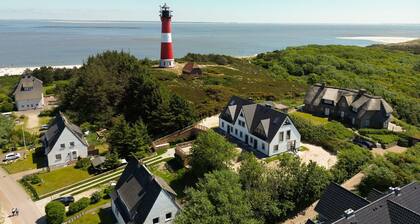 Strandwächter - Luxuriöses Neubau Hausteil auf einem Dünenkamm mit Blick zu