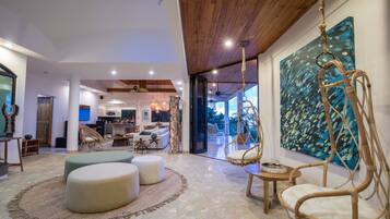 Luxury House | Living area | 50-inch LCD TV with cable channels