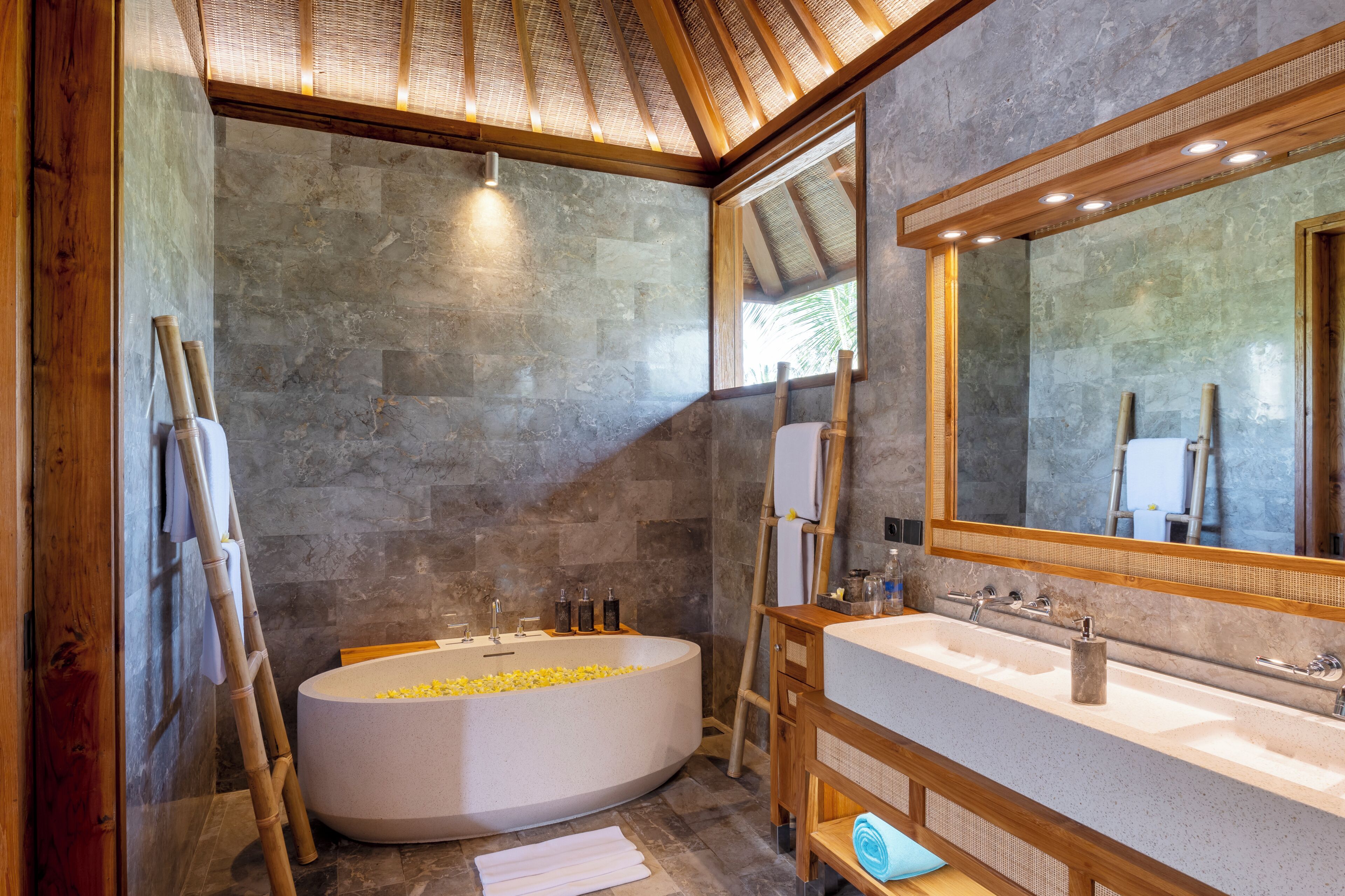 Designer toiletries, hair dryer, bathrobes, slippers