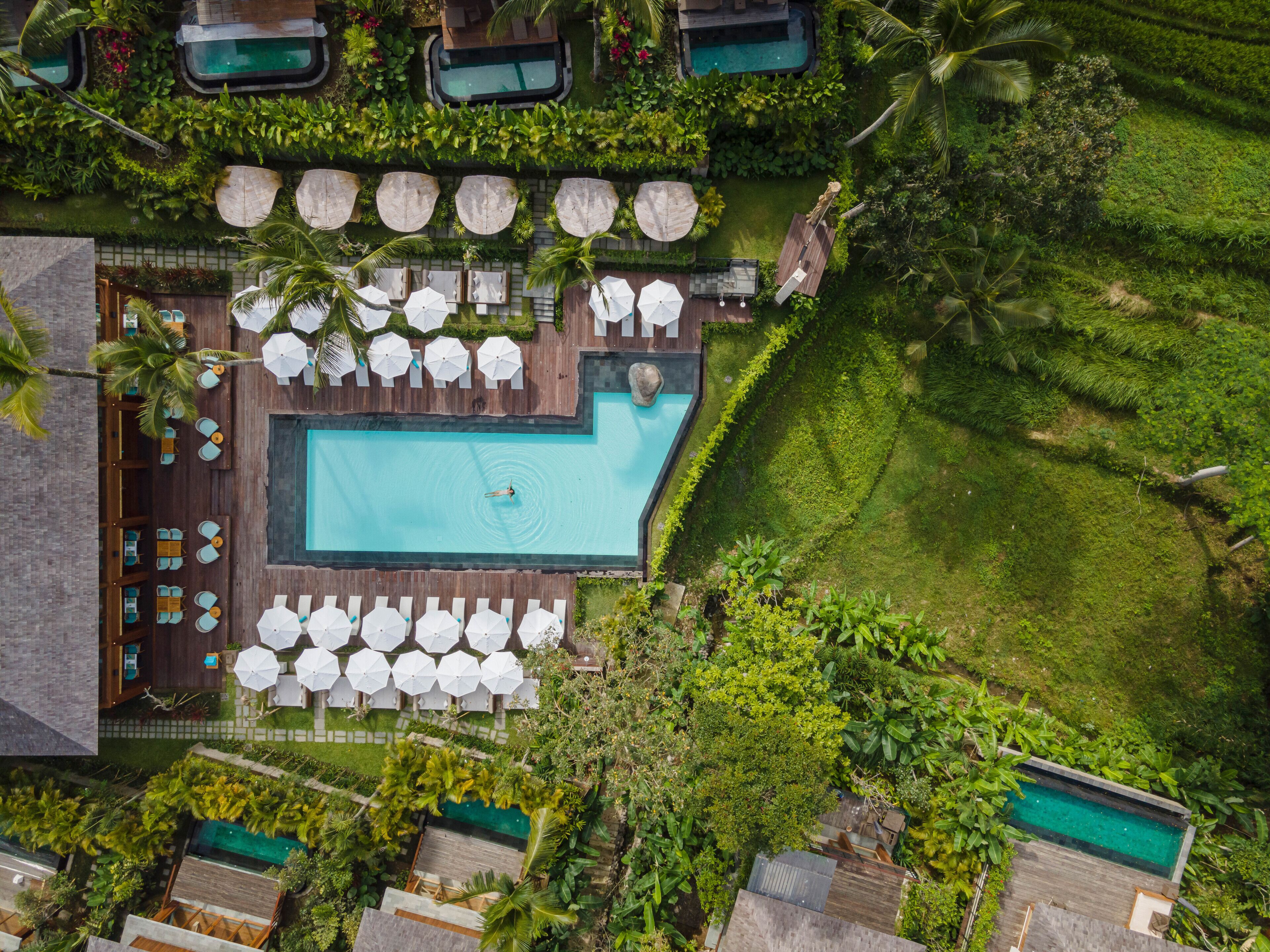 2 outdoor pools, open 10:00 AM to 6:00 PM, free cabanas, pool umbrellas