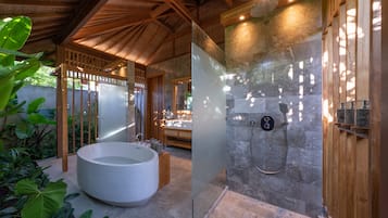 Designer toiletries, hair dryer, bathrobes, slippers