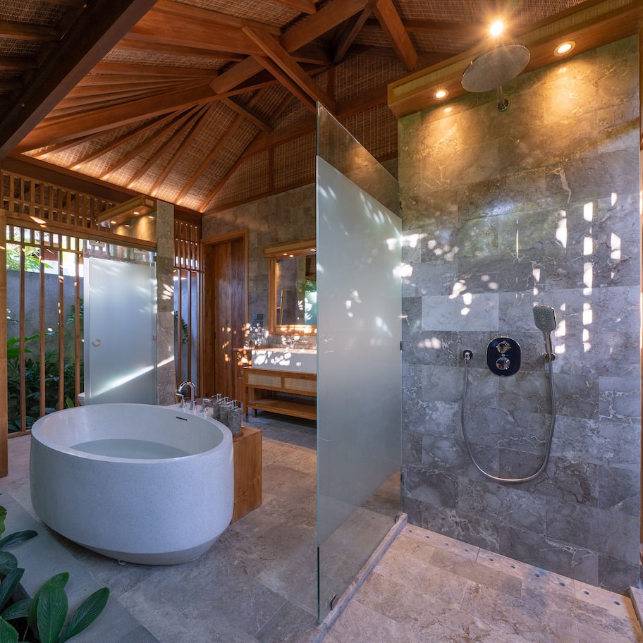 Designer toiletries, hair dryer, bathrobes, slippers