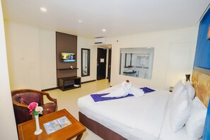 Habitación ejecutiva, 1 cama King size | Ropa de cama de alta calidad, decoración personalizada y escritorio 