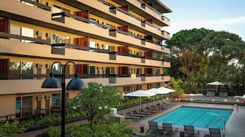 Outdoor pool, open 9:00 AM to 9:00 PM, pool umbrellas, sun loungers
