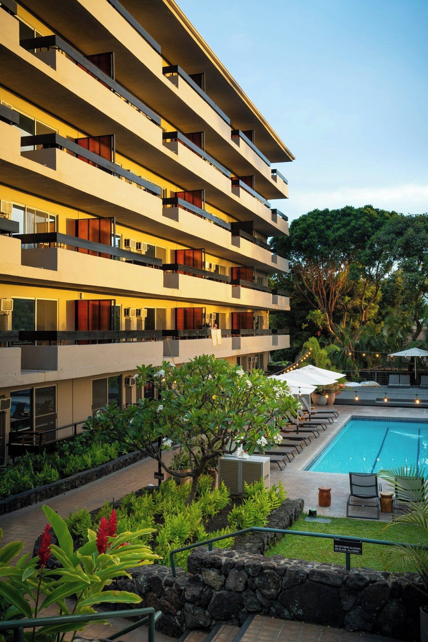 Outdoor pool, open 9:00 AM to 9:00 PM, pool umbrellas, pool loungers