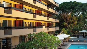 Outdoor pool, open 9:00 AM to 9:00 PM, pool umbrellas, pool loungers