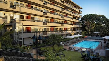 Outdoor pool, open 9:00 AM to 9:00 PM, pool umbrellas, pool loungers