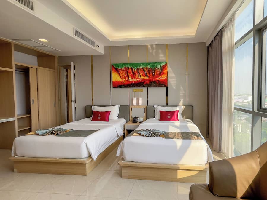 Family Quadruple Room, Multiple Beds | Free minibar items, desk, laptop workspace, blackout curtains