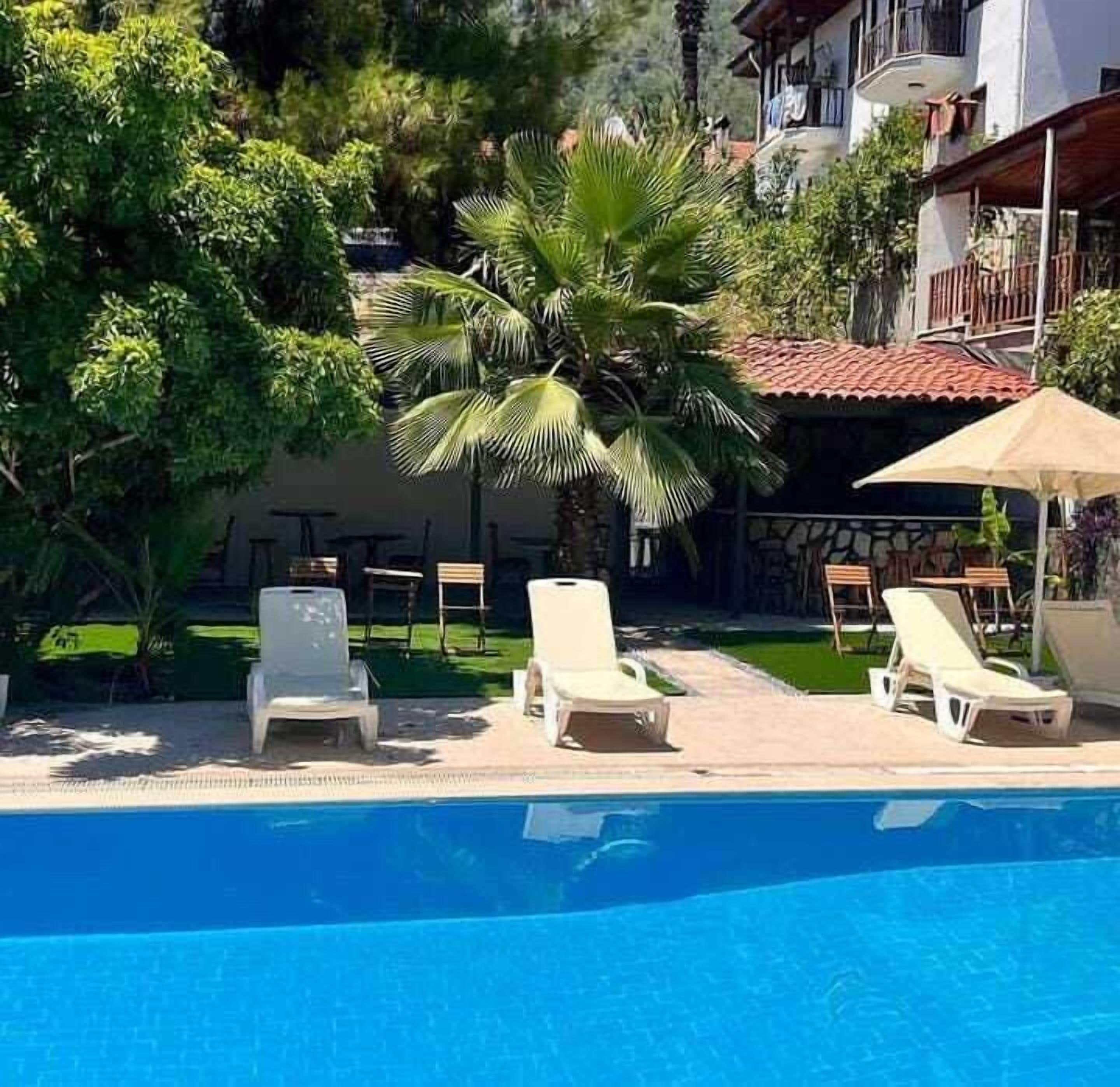 Seasonal outdoor pool, open 8:00 AM to 6:30 PM, free pool cabanas