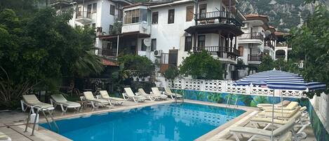 Seasonal outdoor pool, open 8:00 AM to 6:30 PM, free cabanas