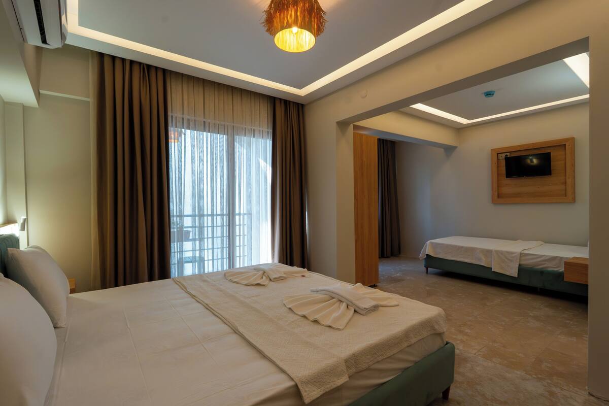 家庭三人房, 1 间卧室 | 防过敏的被褥、Select Comfort 床、免费 WiFi、床单