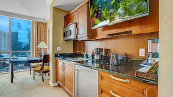 Fridge, microwave, stovetop, coffee/tea maker