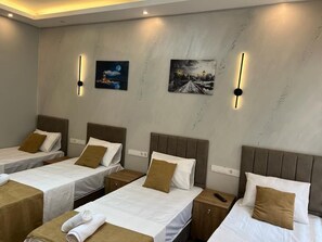 Business Quadruple Room, Multiple Beds | Desk, blackout curtains, soundproofing, iron/ironing board - mr lion kumkapı hotel (Istanbul)