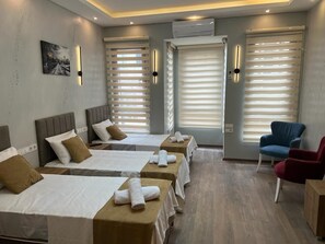 Business Quadruple Room, Multiple Beds | Desk, blackout drapes, soundproofing, iron/ironing board - mr lion kumkapı hotel (Istanbul)