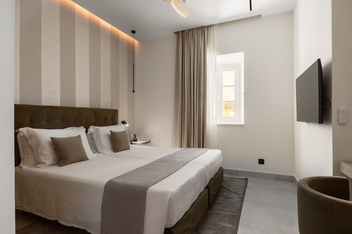 Premium bedding, down duvets, individually decorated