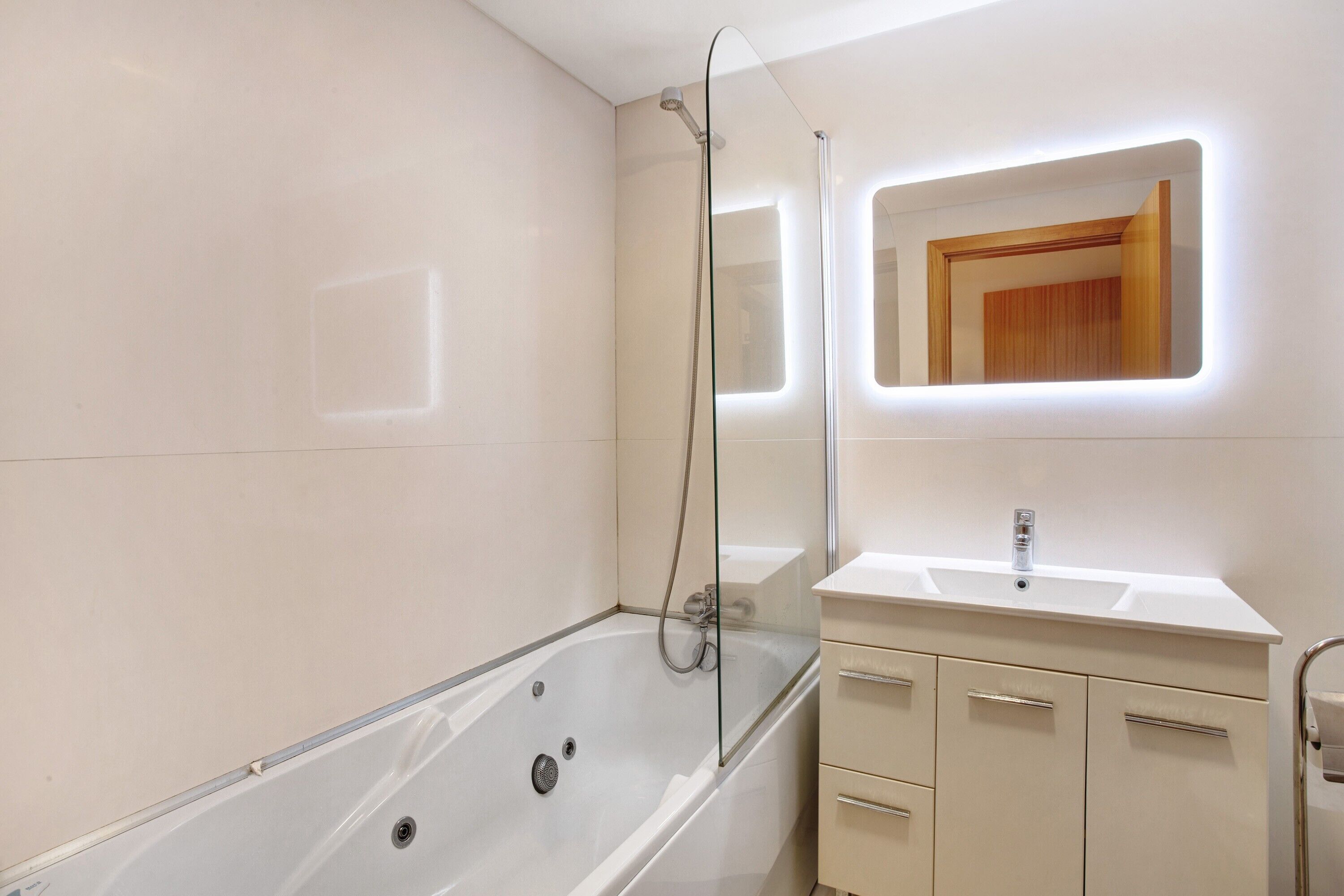 Bathtub, hair dryer, towels