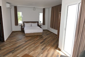 Suite | 1 chambre, minibar, accĂšs au Wi-Fi (inclus), literie fournie