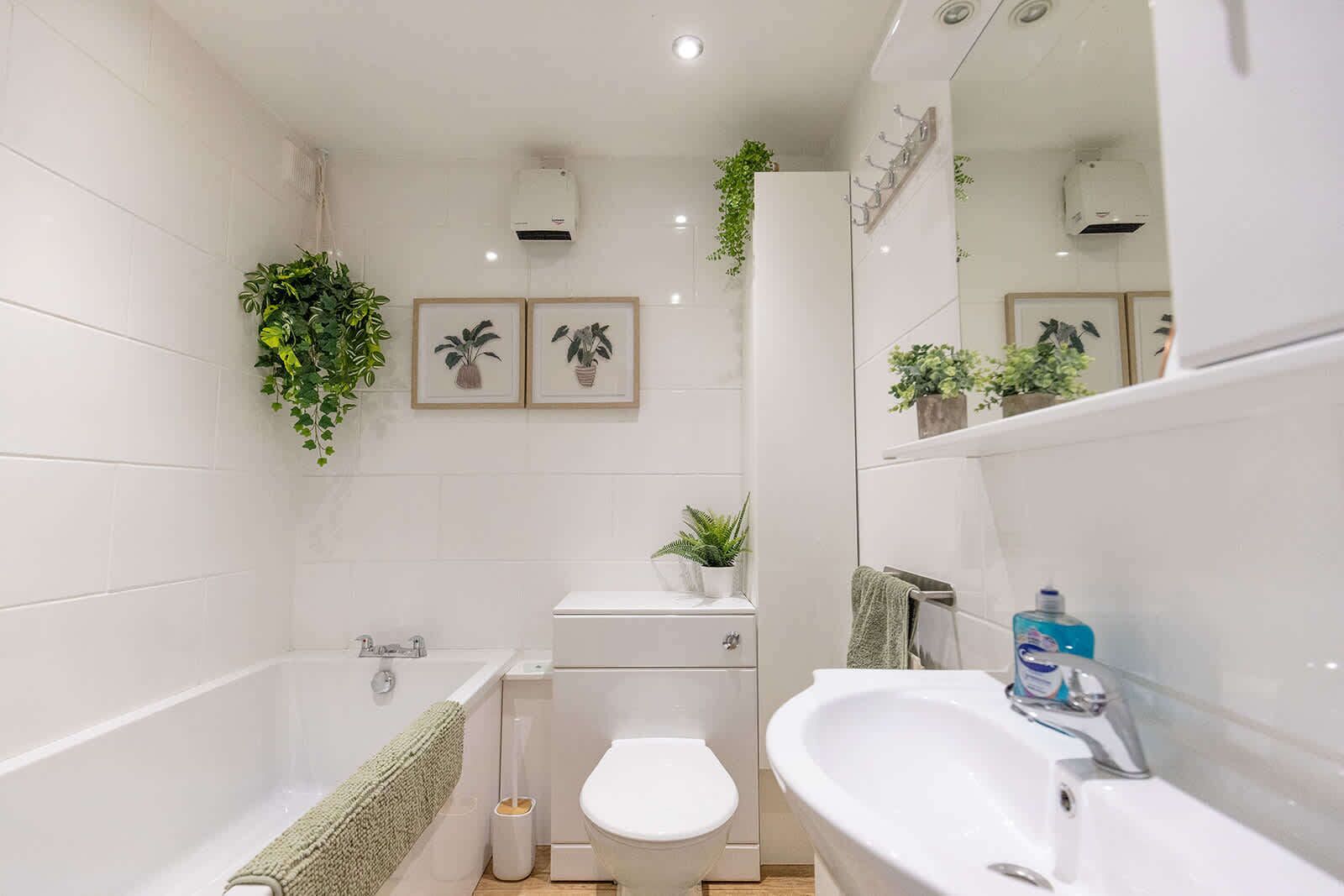 Shower, hair dryer, towels, shampoo
