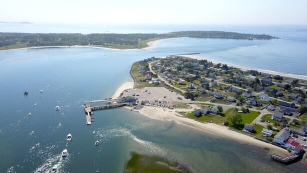 An aerial view of a coastal residential area with houses, a beach, and a pier. - Beachwood Cottage by Bayley Vacation Rentals (Scarborough)