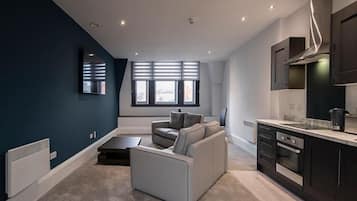 Appartement, 2 chambres | Coin séjour | TV connectée de 50 pouces avec chaßnes numériques, télévision