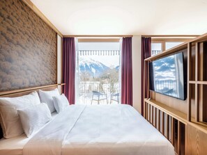 Premium Suite | Minibar, in-room safe, desk, blackout curtains - Falkensteiner Family Hotel Montafon - The Leading Hotels of the World (Tschagguns)