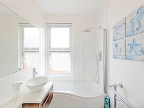 Combined shower/tub, hair dryer