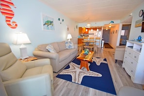 Condo, 2 chambres | Aire de séjour