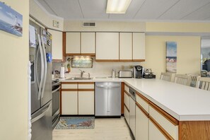 Condo, 2 Bedrooms | Private kitchen | Fridge, coffee/tea maker, toaster