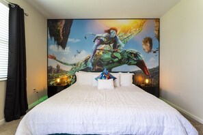 Cozy retreat with a vibrant mural on the headboard, featuring a fantastical scene.