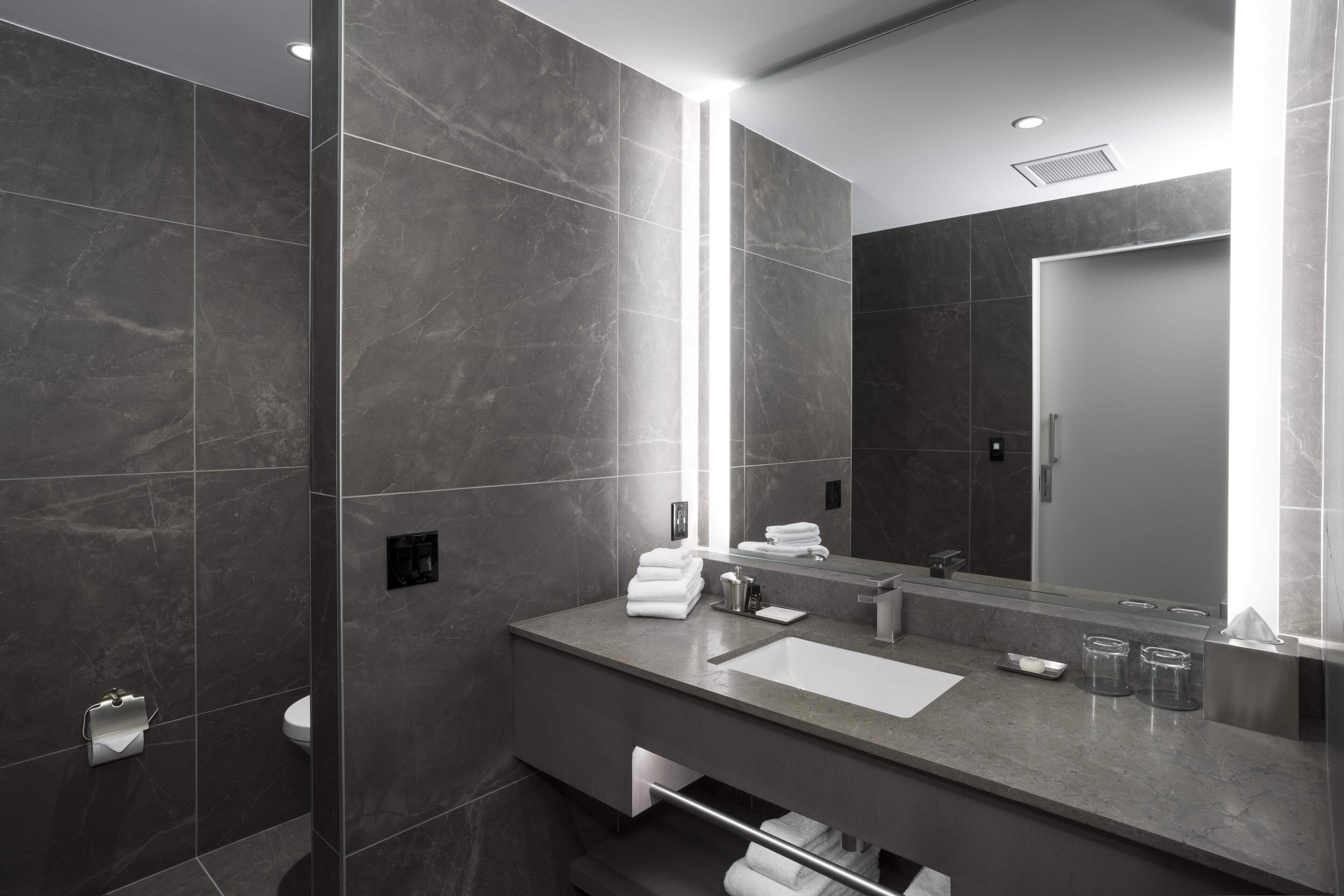 shower, hydromassage showerhead, designer toiletries, hair dryer