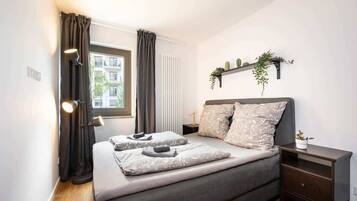 2 habitaciones, tabla de planchar con plancha, wifi y ropa de cama