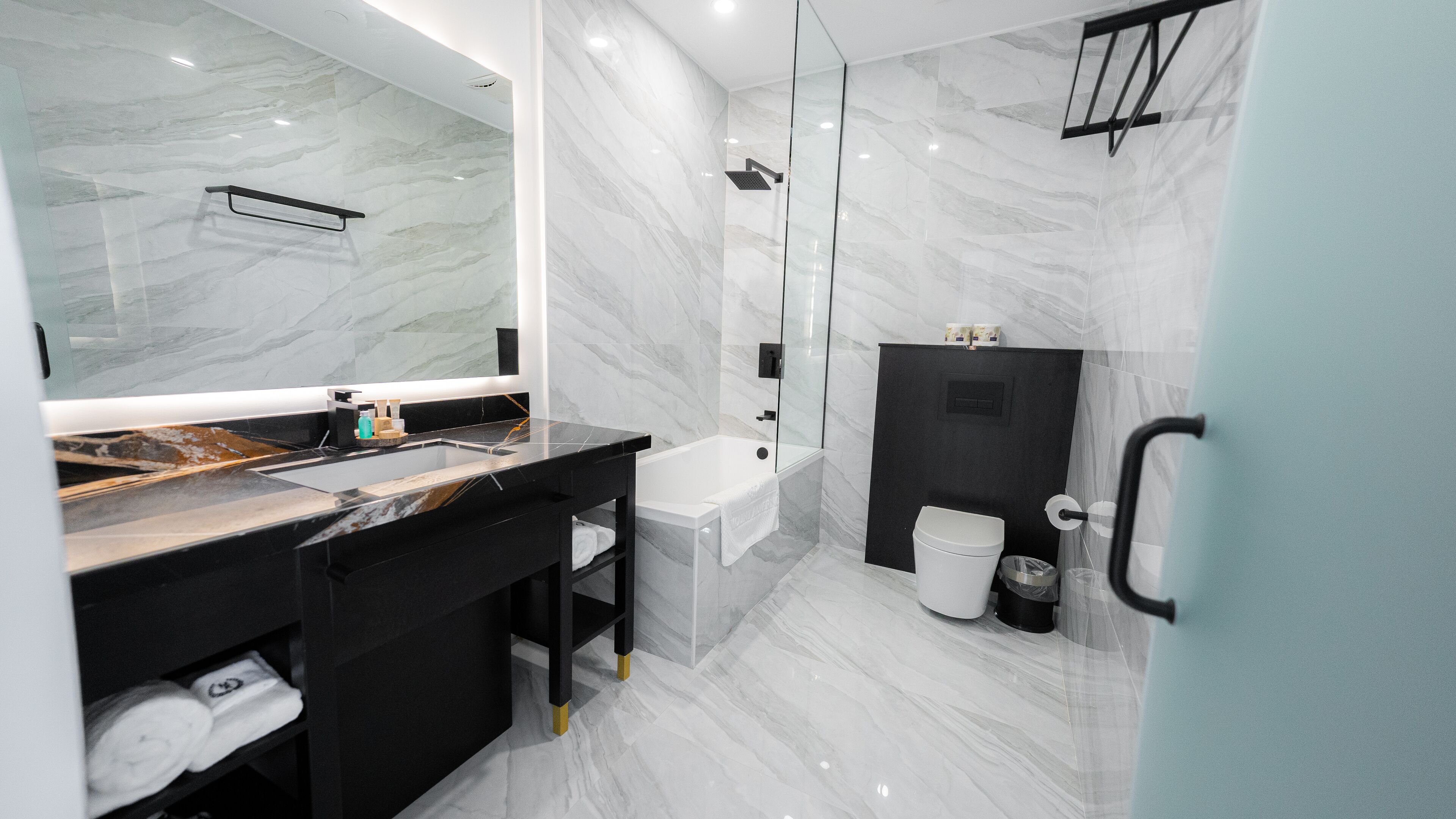 hair dryer, bathrobes, slippers, towels