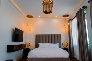 Habitación ejecutiva | Ropa de cama de alta calidad, camas con efecto memoria y minibar 
