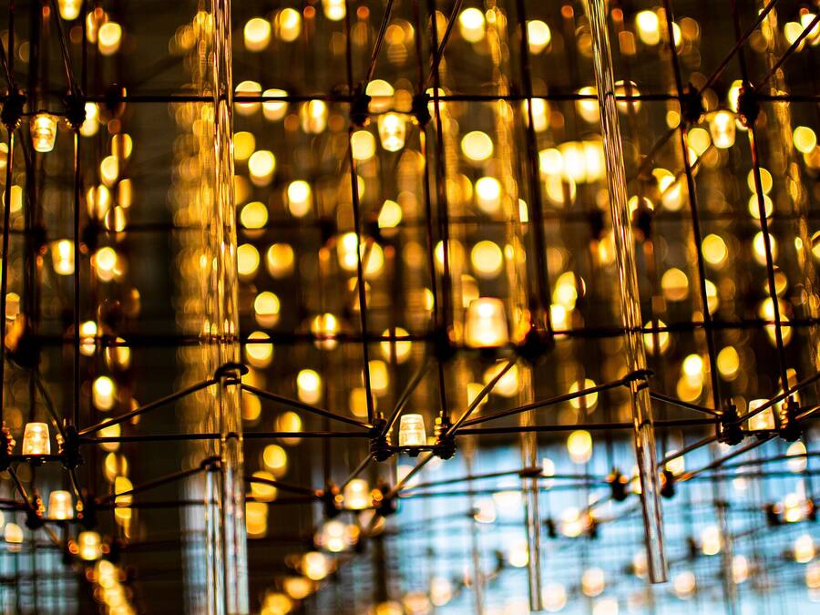 A close-up of a decorative light installation with multiple bulbs.