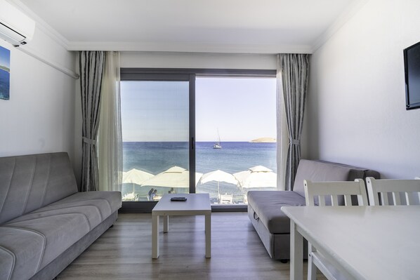 Suite estudio clásica, 1 habitación | Área de sala de estar