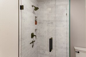 Combined shower/tub, hair dryer, towels, soap