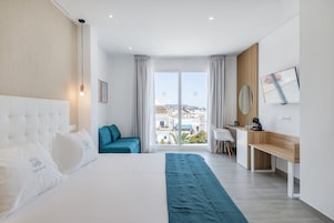 Premium Double Room, Pool View | In-room safe, individually decorated, desk, laptop workspace