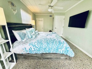 1 bedroom, desk, iron/ironing board, travel crib