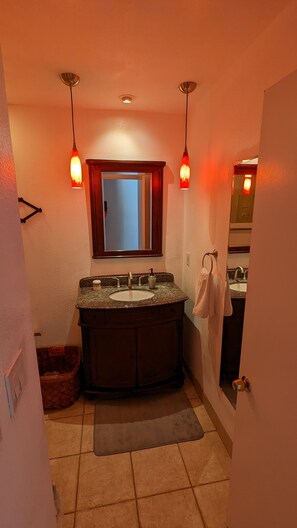 Combined shower/tub, hair dryer, towels, soap