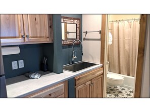 Bathtub, hair dryer, towels