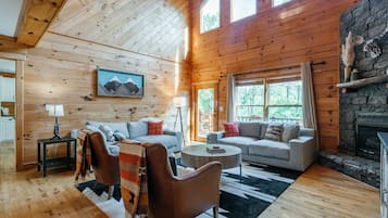 Smart TV, fireplace, table football, books