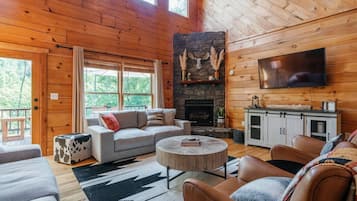 Smart TV, fireplace, table football, books