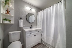 Combined shower/tub