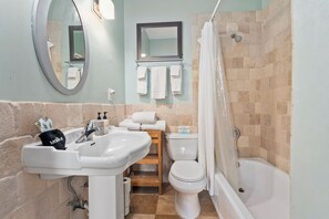 Combined shower/tub, hair dryer, soap, shampoo - LUXURY SUITE KING AT OLD COLORADO INN (Stuart)