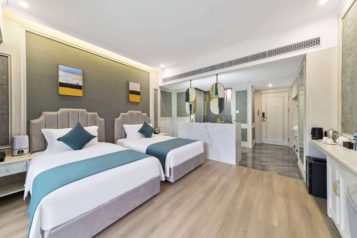 Chambre, 2 lits une place, non-fumeurs (Leisure) | Minibar, coffres-forts dans les chambres, Wi-Fi gratuit