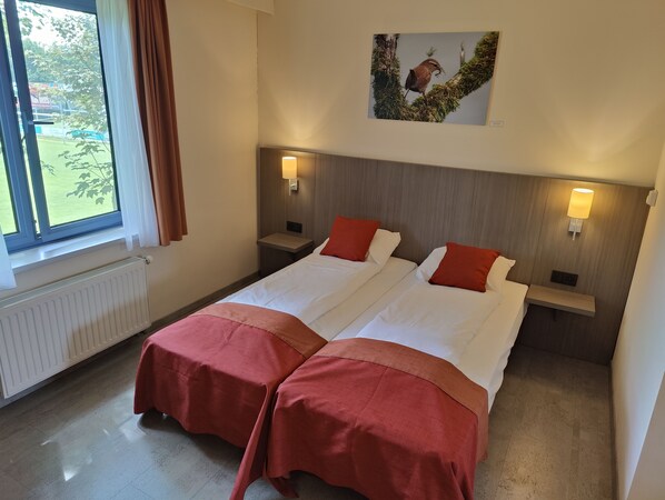 Desk, free WiFi, bed sheets