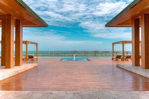 Beach nearby, black sand, beach bar