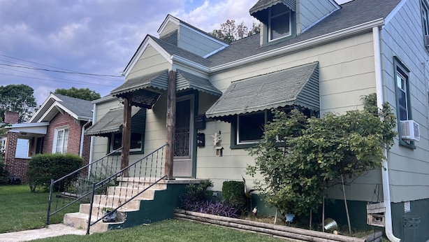 A two-story house with a front porch, a staircase, and a small garden area. - Bristol Short Stay for work, Nascar,Music, 1bdrm King size, Queen sleeper sofa.  (Bristol)