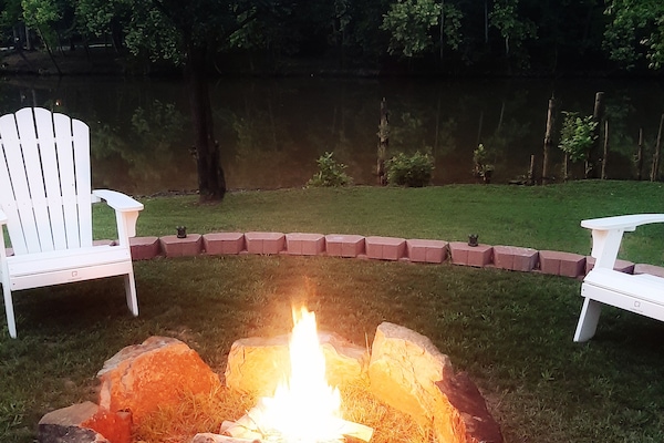 Natural stone firepit. Relax down by the water. Free firewood